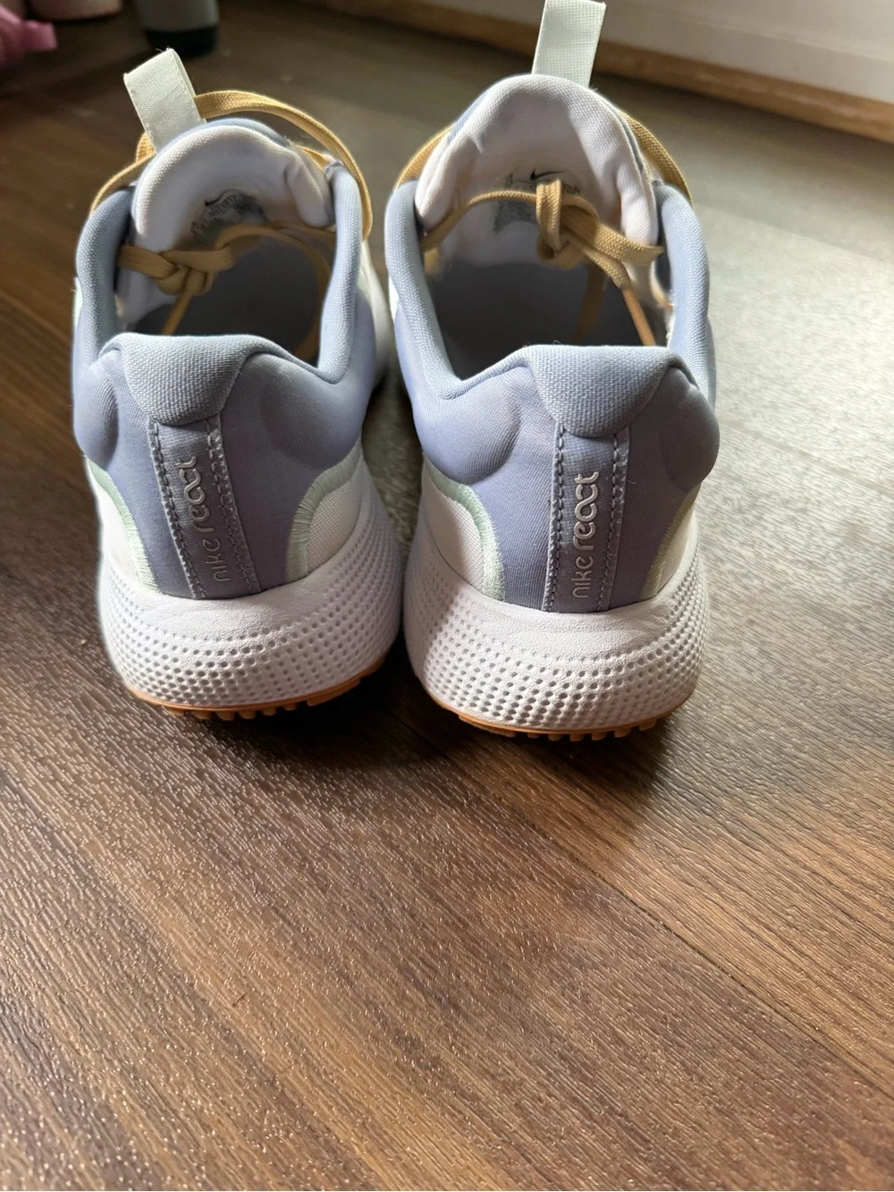 Nike Kids White Sneakers with Pale Yellow Accents